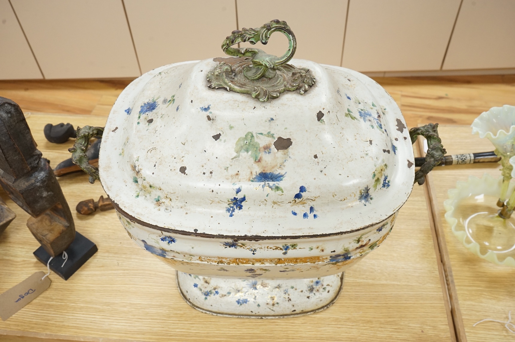 A 19th century painted toleware log box and cover hand painted with flowers, 58cm wide